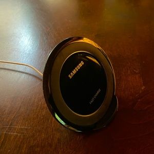 Samsung cordless phone charger. Works with iPhone also. As New. No box.